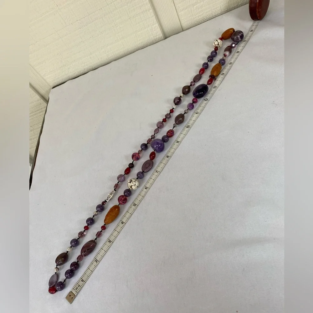 Long polished amethyst stone carved bead necklace